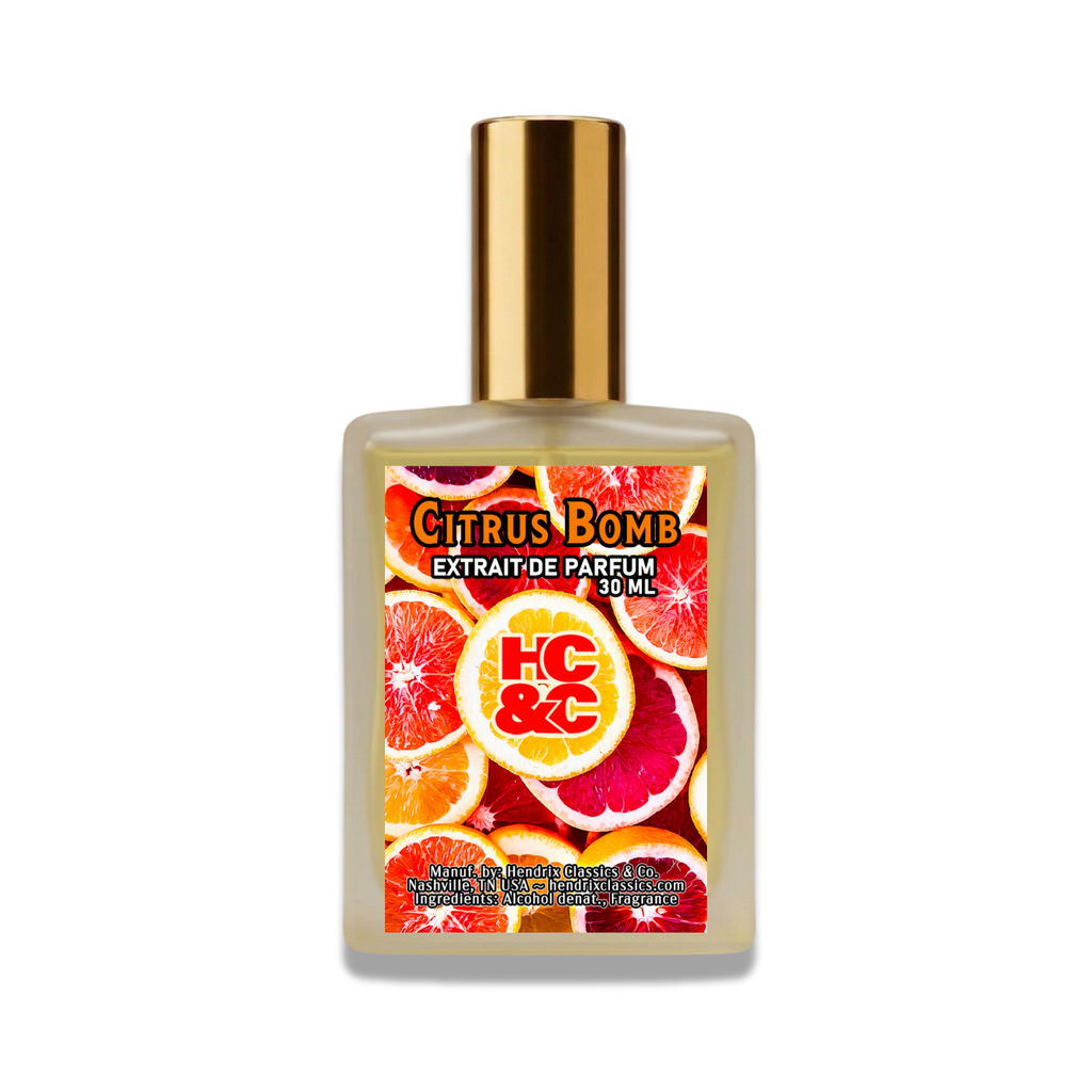 Perfume bottle labeled 'Citrus Bomb' with a gold cap on a white background